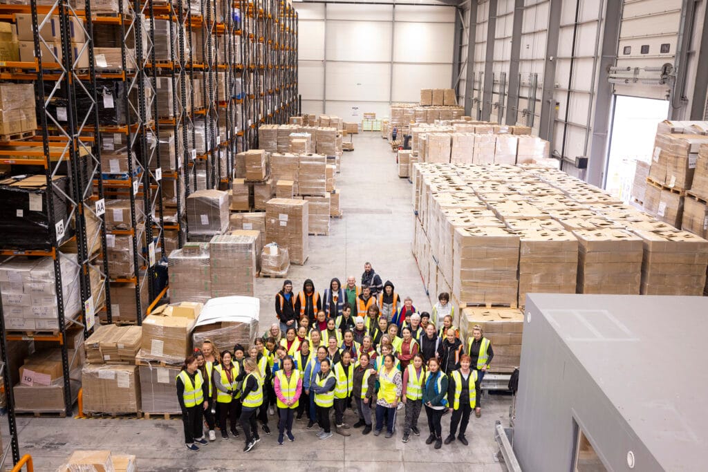 Finishing line workers in warehouse
