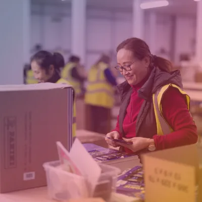 Staff member on the production line with a coloured overlay