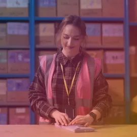 Staff member working with product with a coloured overlay