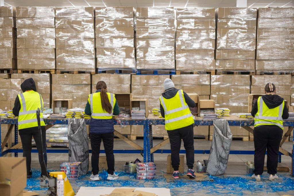 Viva Health: The Rise of Health & Wellbeing Testing Kits 3 Finishing line contract packing workers on the line